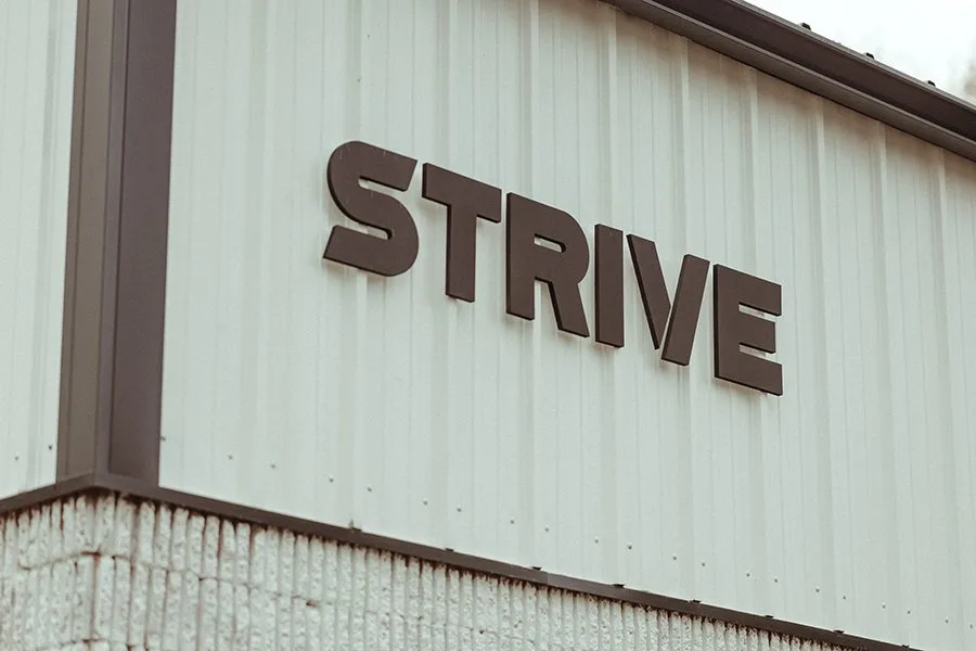 STRIVE signage on the Duxbury building exterior