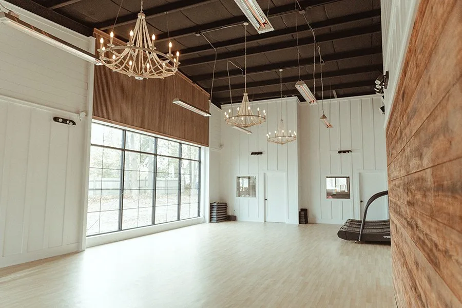 STRIVE Norwell studio interior with treadmills and natural light